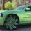 2010 Dodge Charger sitting on 26″ Black&Green Azara 502 wheels wrapped in 275/25-26 lexani tires in 1436 Baldwinville MA